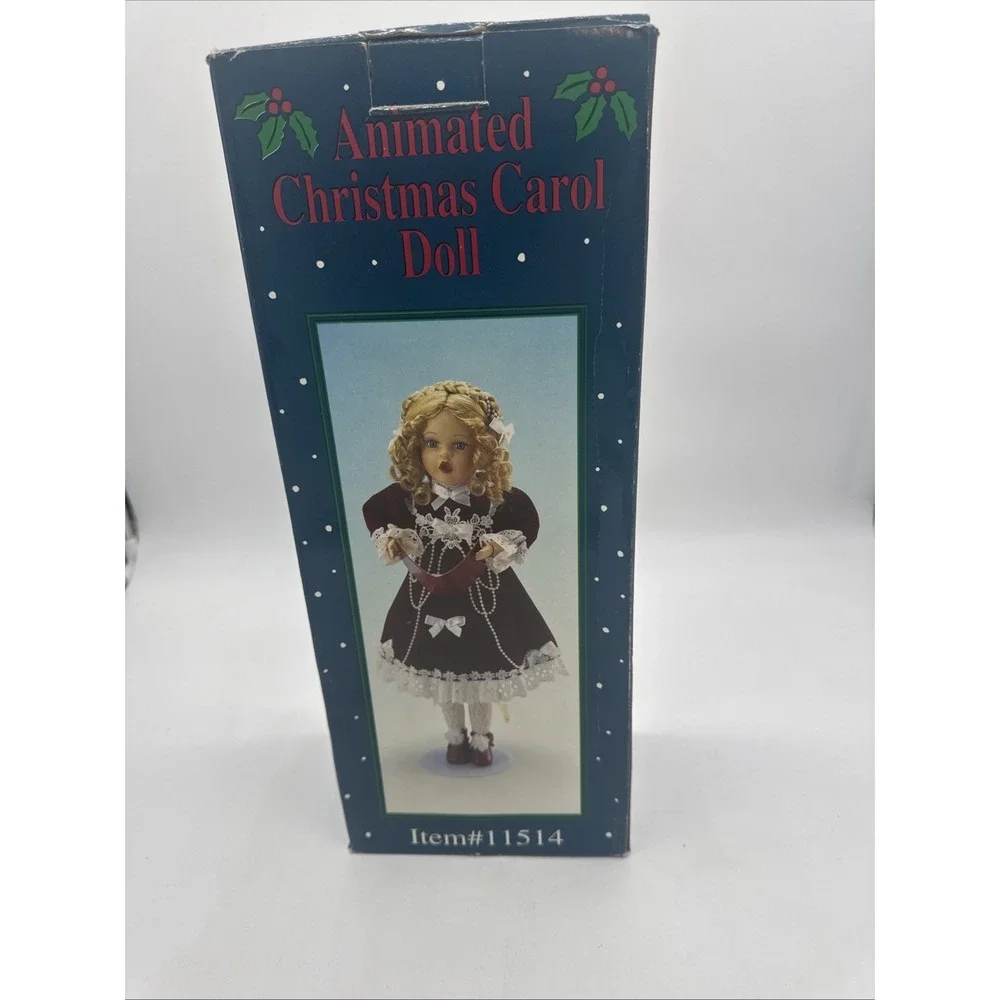 Animated Christmas Carol Doll‎